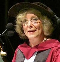 Frances Pinter in academic robes receives the Honorary Degree of Doctor of Letters from Curtin University.