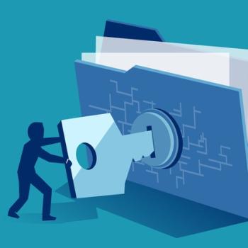 Figure turning a key to open a locked file