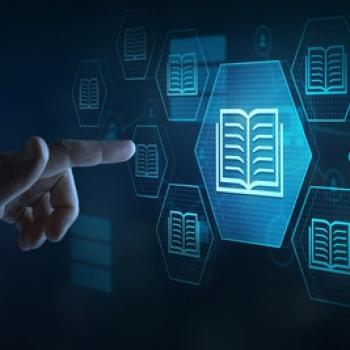 Hand pointing toward digital book icons displayed on a virtual interface.